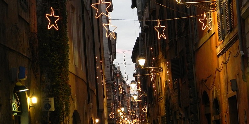 A stunning view of the decorations of Via Dei Coronari streets at night