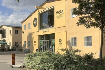 An image showing the exterior of the Viking Museum, showcasing its unique architectural style.