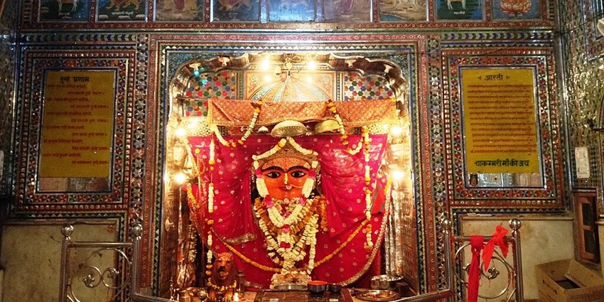 Inside Shakambari Devi temple with mata placed at the altar decorated with garlands