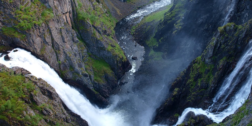 An image of Vøringsfossen waterfall showcasing the impressive cascade over rocky cliffs.