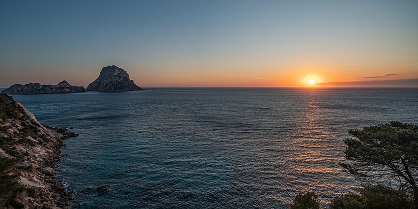 Sunset at Es Vedrà: One of the top things to do in Ibiza