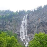 An image showing a view of the Röthbach Waterfall, one of the largest waterfalls in Germany.