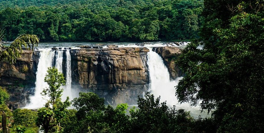 An image of Athirapally Falls, which is one of the famous waterfalls in South India