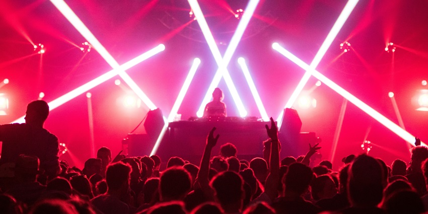 An image showing people dancing at the vibrant Watergate Club in Berlin nightlife.