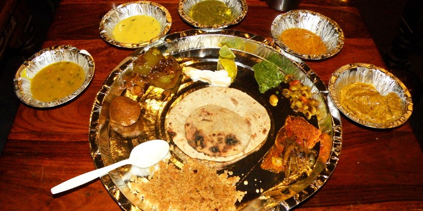 The chapathi-making process in Chokhi Dhani located in Jaipur and Jodhpur.