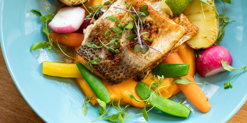 Dining on Silhouette Island offers diverse cuisines in breathtaking scenic settings.