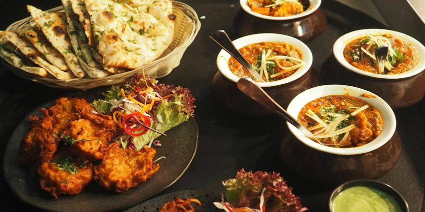 An image of delicious Gujarati dishes served at local eateries during Uttarayan, which is the harvest festival of Gujarat.