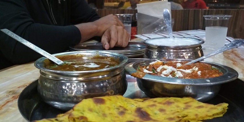 An image of delicious Punjabi dishes served at local eateries during Baisakhi festivities