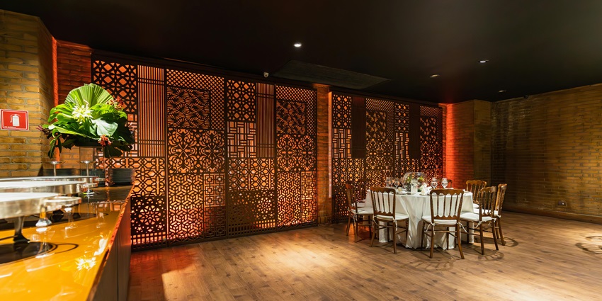 An image showing a restaurant beautifully decorated with festive elements for a celebration.