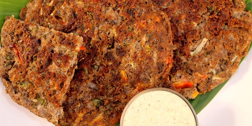 One of the famous dishes of Tamil Nadu, rice uttapam, served near Patteeswaram Temple