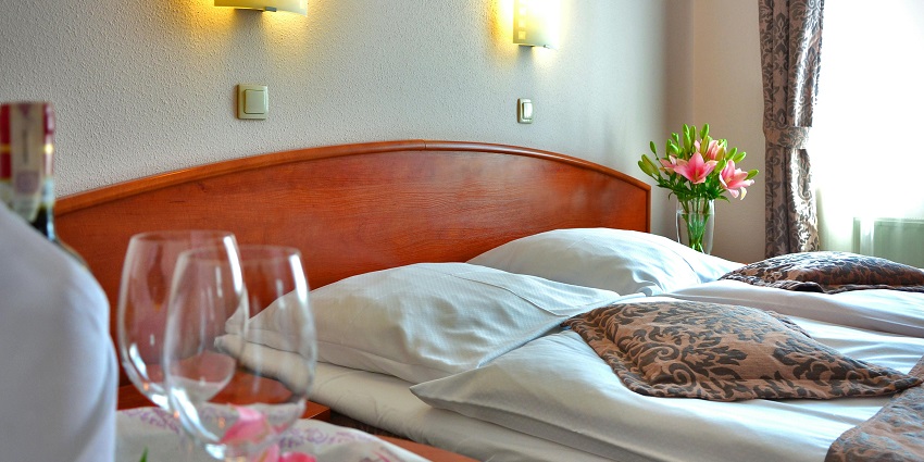 A hotel room, resembling the rooms available around the Manchester Art Gallery.