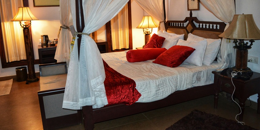 View of a cosy hotel room with decent facilities.