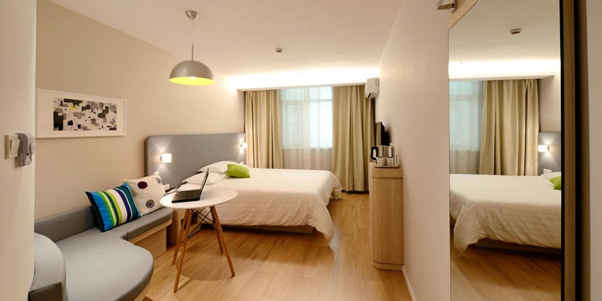 Image from the inside of the bedroom interior of a hotel room