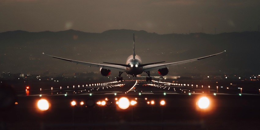 Image of an aeroplane taking off from the runaway from the airport in Myanmar
