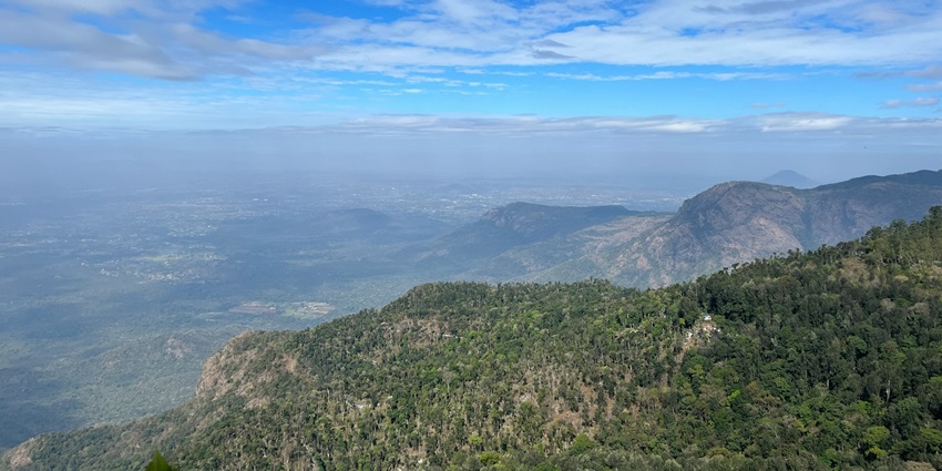 An image showing Yercaud, a hill station in Tamil Nadu with plantations and rocky terrain