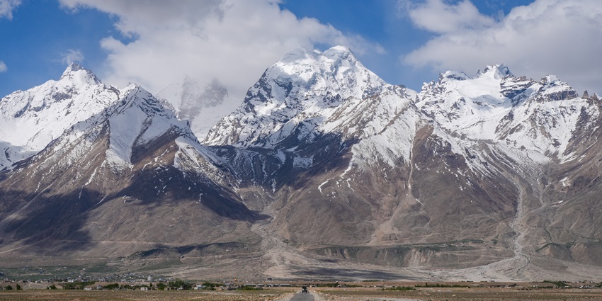An image of the Road Padum Zanskar Range in Zanskar Valley with snow capped mountains