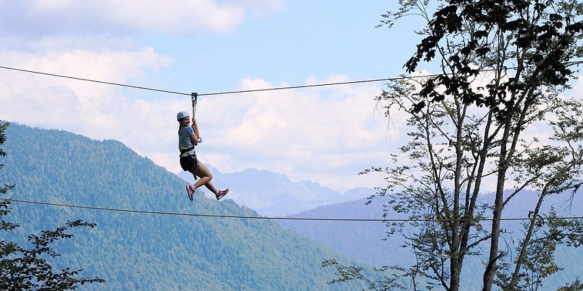 Experience thrilling zipline rides through lush rainforest canopies, among the best things to do in St. Lucia in December.