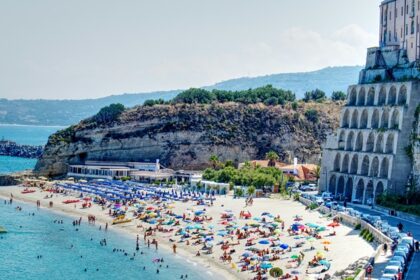 Enjoy sunbathing and other activities - one of the best things to do in Italy in August.