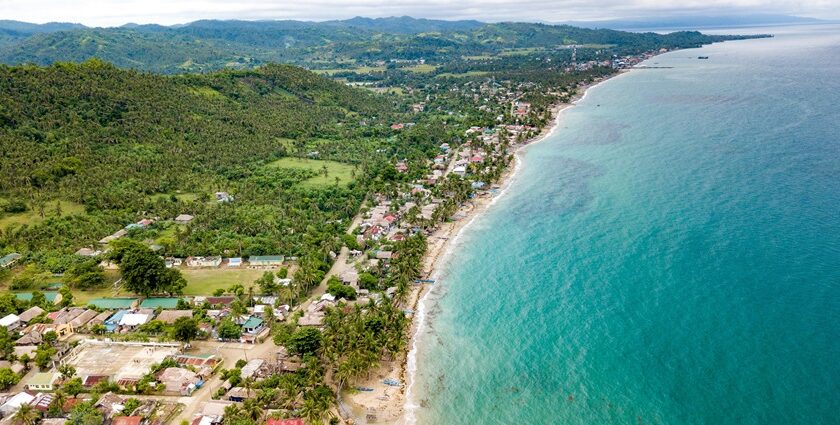 Aerial view of Cebu beaches boasting crystal-clear water, white sand, and coastal views.