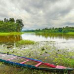 A picture of Chandubi Lake, peaceful natural lakes in Assam, surrounded by views.