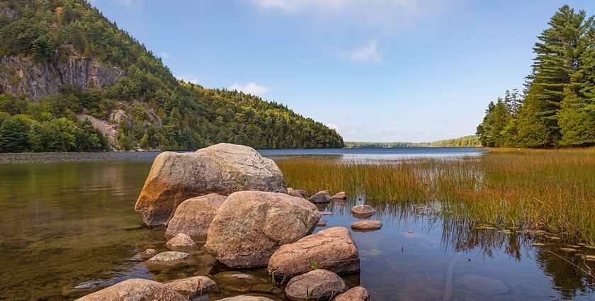 A dramatic show of clouds over Maine’s Echo lake during a mesmerising sunset.