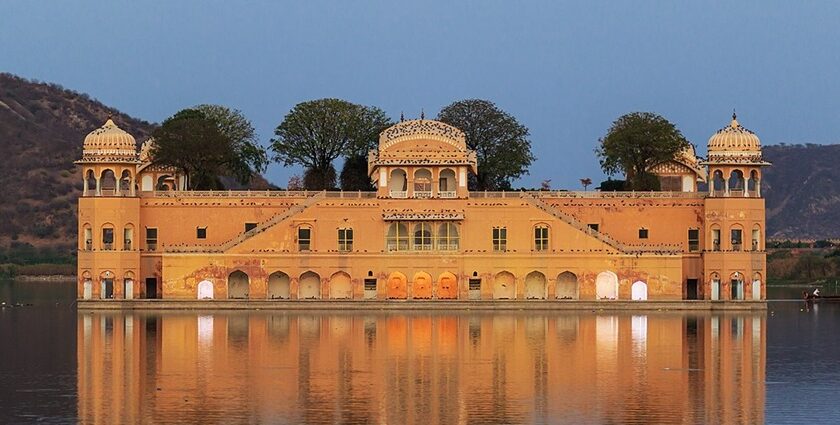 An image of the iconic Jal Mahal in Rajasthan, with calm waters and a scenic view