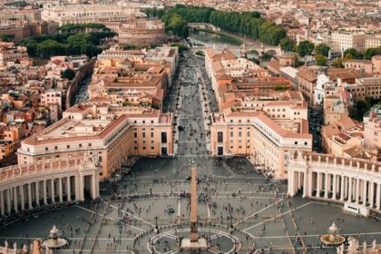 Vatican City, one of the places to visit in Rome, is beautifully lit up at the time of dusk.