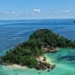 Aerial view of the Seychelles with its white-sand beaches and tropical terrain