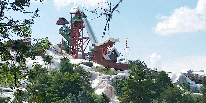 An image showing Blizzard Beach, part of Disney World water parks, with slides and attractions