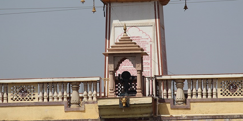 Image of a day time temple entrance with stunning architecture of historical significance