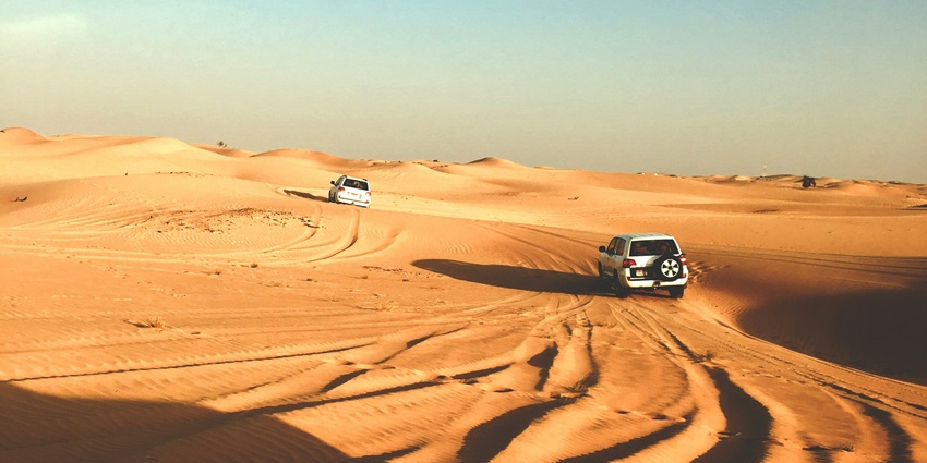 Abu Dhabi gives camel rides, mesmerising sunsets, and an authentic Bedouin-style dinner.
