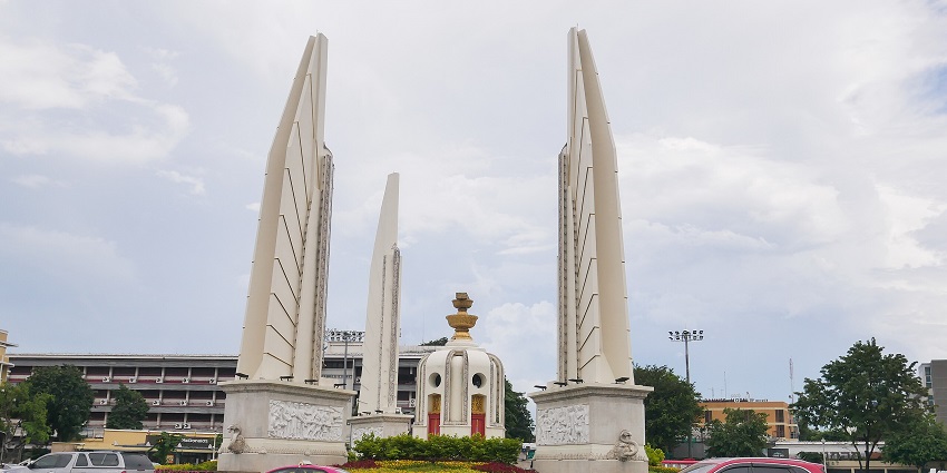 An image of the beautiful Democracy Monument, Bangkok, and its detailed carvings and symbolic architecture.