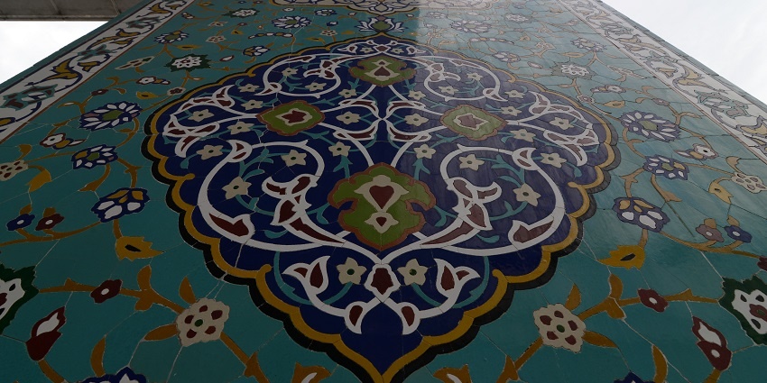 The stunning dome of the museum with geometric and scriptural patterns.