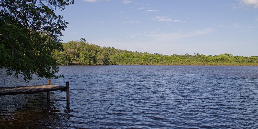 A view of the Aguacate lagoon with clear waters, one of the stunning lakes in Belize.