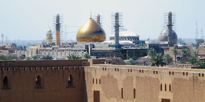 The golden domes of Al-Askari Mosque, a revered Shia mosque in Samarra, Iraq.