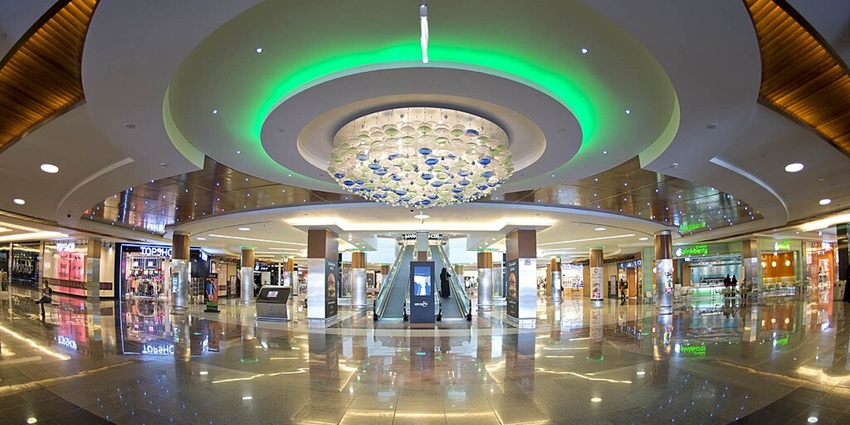 Shoppers explore Al Hamra Mall in Ras Al Khaimah, enjoying a vibrant retail experience
