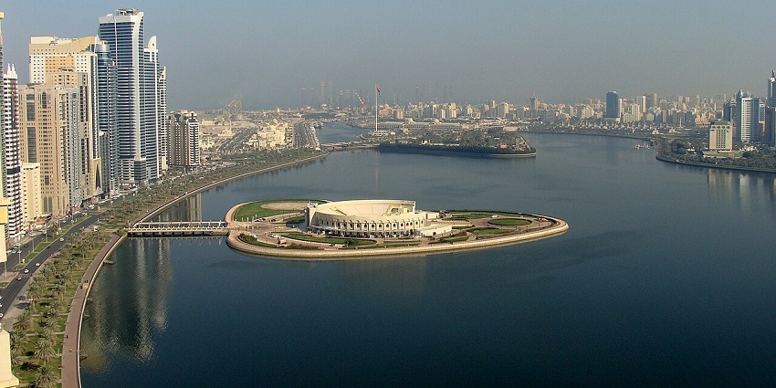 Experience waterfront dining, family attractions, and scenic views at Al Majaz Island.