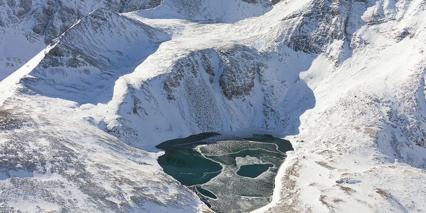 A striking wilderness of snow-covered peaks, nomadic culture, and pristine alpine lakes.