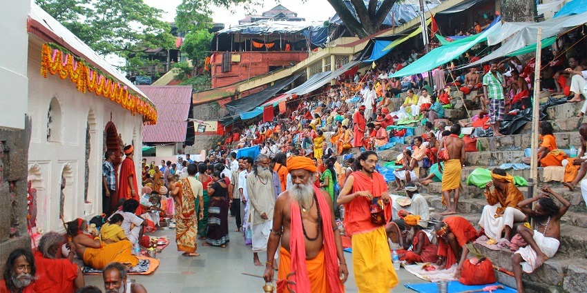 An image showing devotees gathered at Kamakhya Temple during the Ambubachi Mela festival.