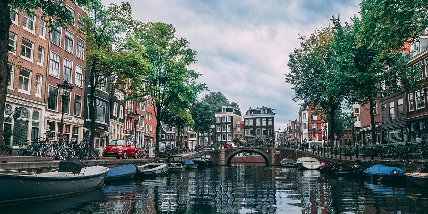 Wander through Amsterdam’s scenic canals, historic museums, and lively streets.