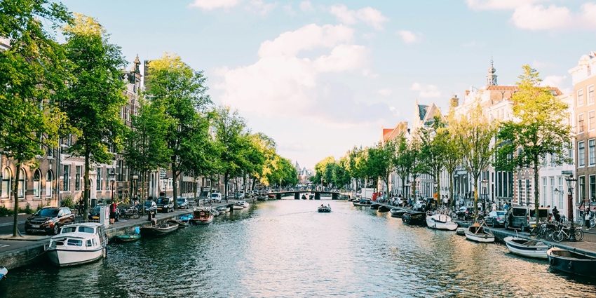 Explore places to visit in Europe in May featuring scenic canals and cultural attractions.
