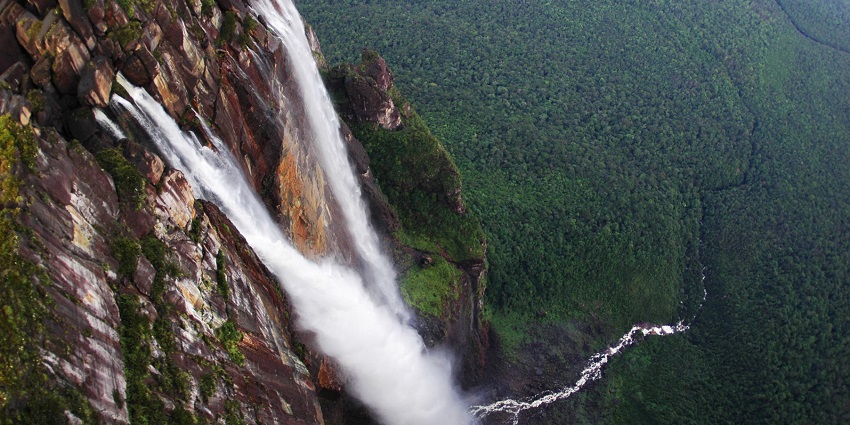 An image of the Angel Falls, one of the best waterfall trekking places in dense rainforest