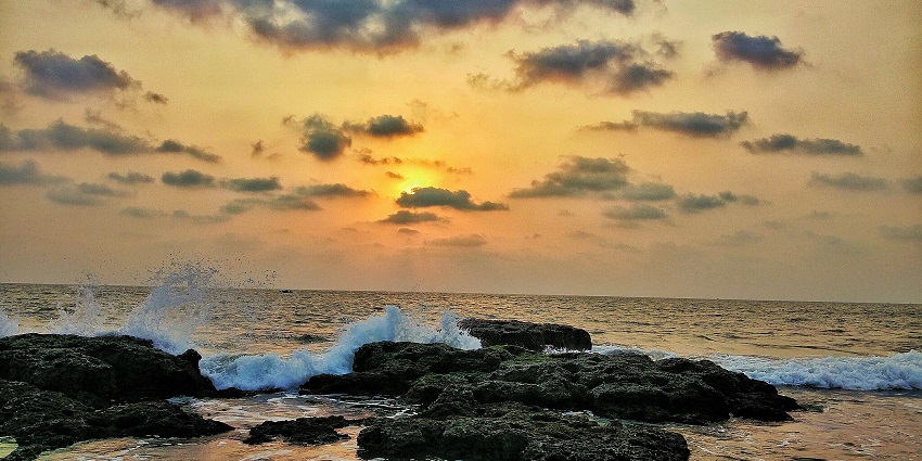 A famous Goan beach is known for its stunning coastline, flea markets, and beach parties.