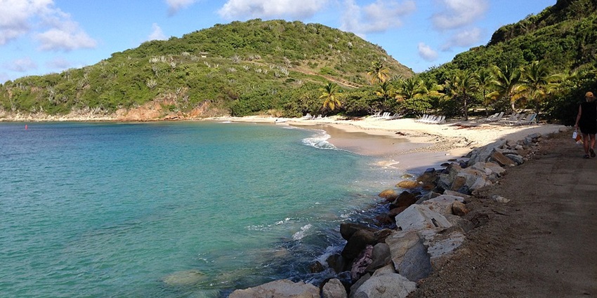 Apple Bay, a gem, boasts pristine white sand and powerful surf for skilled riders