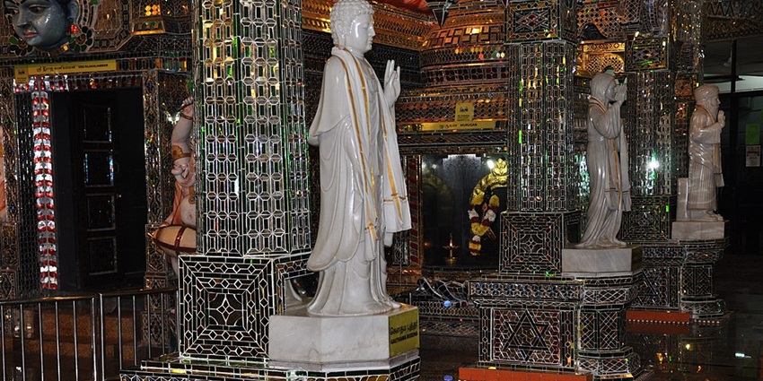 Stunning glass interior with marble statue at Arulmigu Sri Rajakaliamman Glass Temple