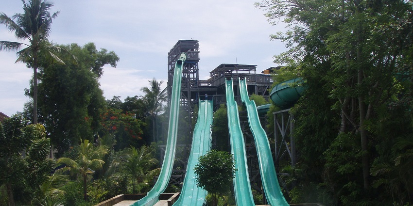An image of a water paradise in Jakarta, featuring giant slides and a thrilling wave pool