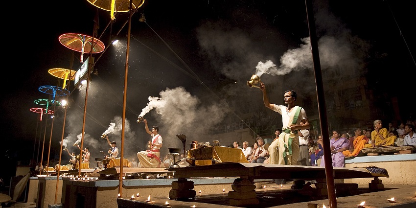 A nighttime Hindu Aarti ceremony in Varanasi - one of the things to do in India in July.