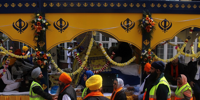An image showing people celebrating Baisakhi, a traditional New year festival celebration in India.