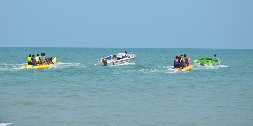 An image resembling a banana boat ride, one of the best water sports in Benoa Bali.