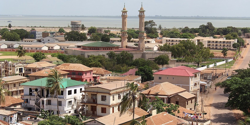 Banjul, Gambia skyline featuring historic buildings, coastal views, and a vibrant cityscape.